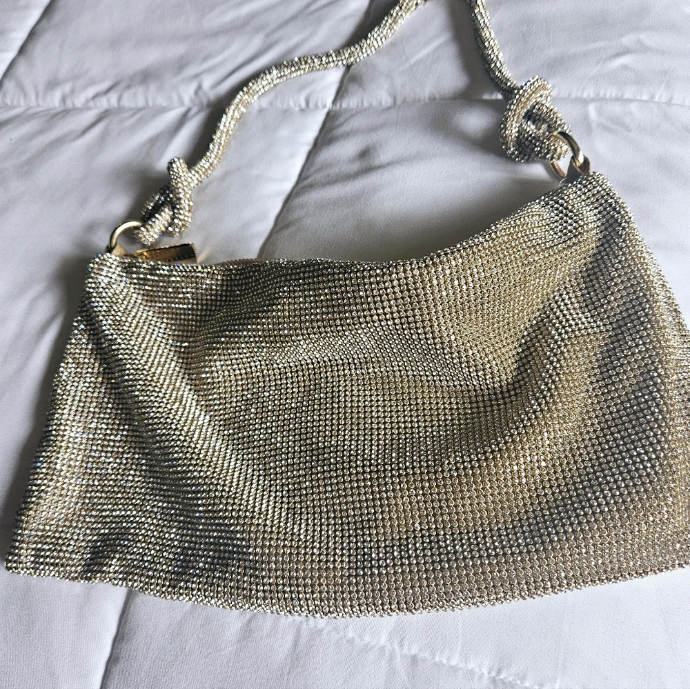 Express rhinestone knot strap slouch bag gold